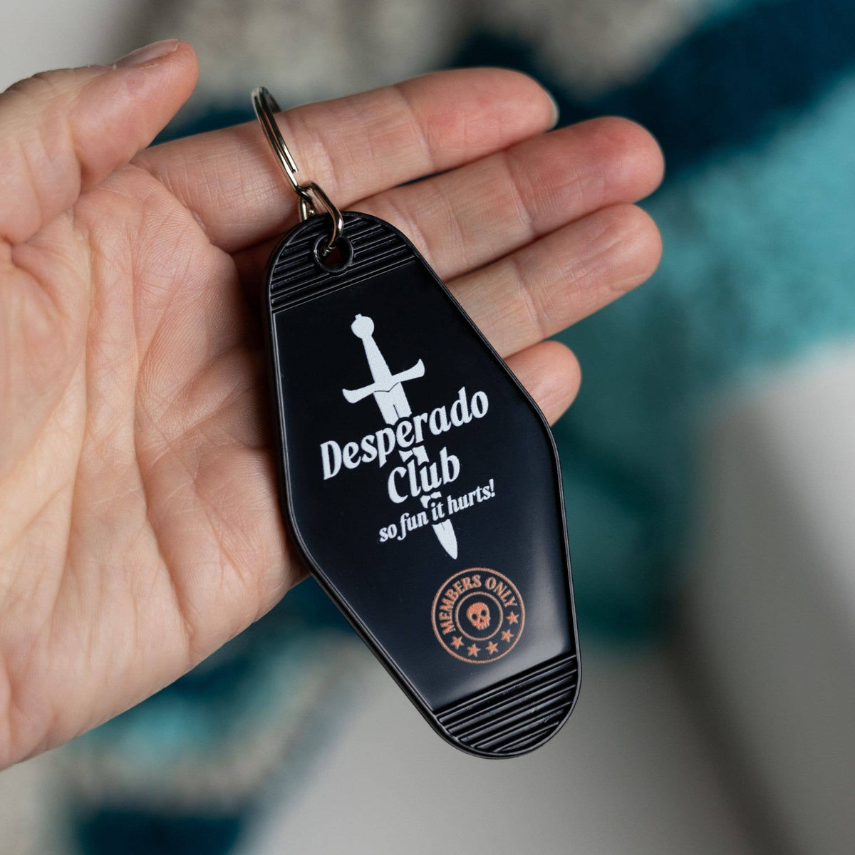 Desperado Club Motel Keychain | Dungeon Crawler Carl